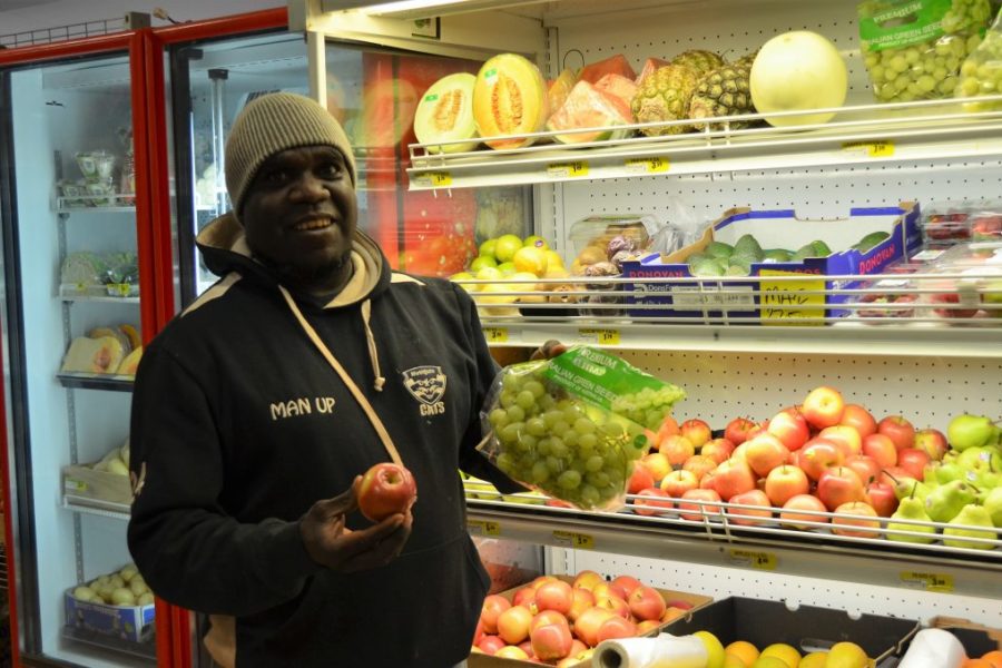 Man shopping for fresh fruit