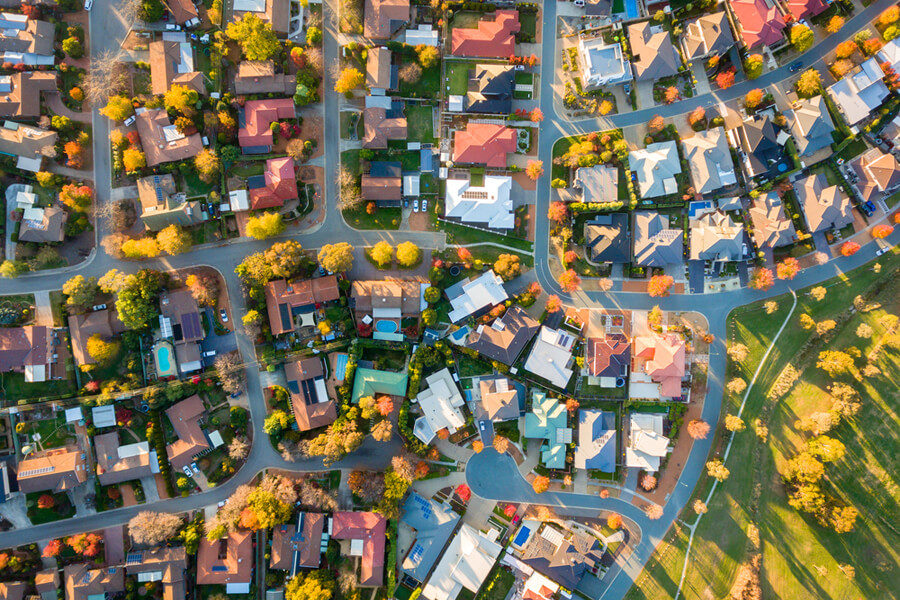 Aerial birds-eye view of suburban housing