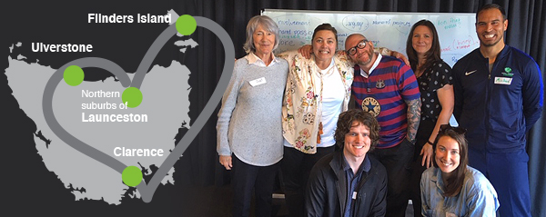 The left side of the image shows a map of Tasmania with 4 places marked: The northern suburbs of Launceston, Flinders Island, Clarence and Ulverstone. Curved lines in the shape of a heart are connecting these 4 places. The right side of the image shows Judi Walker, Alison Oliver, Tim Galpin, Fakington Wilde, Emily McKinnon, Georgia Axton and Michael Monticchio.