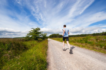 A jogger on a country road