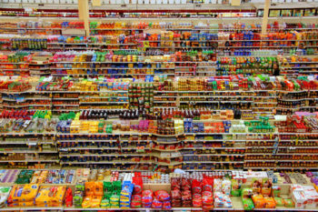 A large supermarket stacked with many foodstuffs