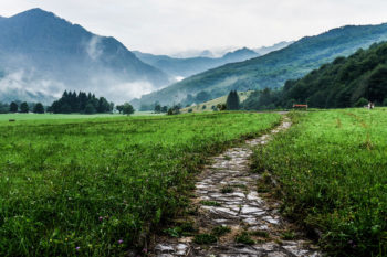 A path through a mountain landscape