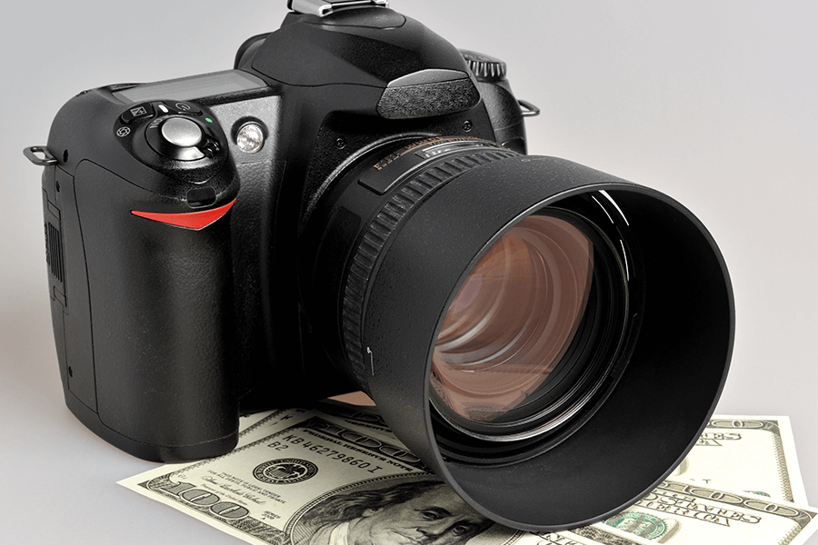 Camera with close up lens on top of money