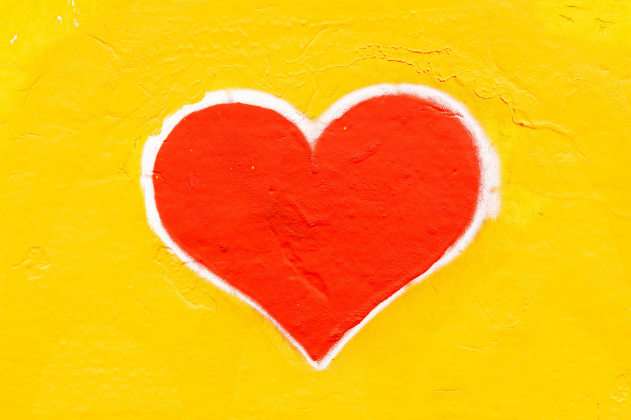 red heart on yellow background