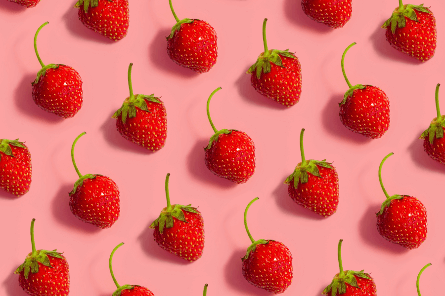 strawberries on pink background