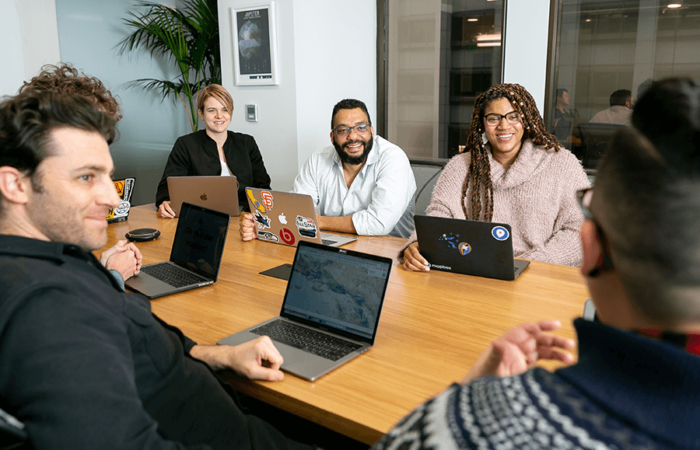 Office workers smiling