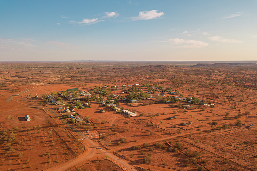 Aerial view of Finke, Northern Territory, an aboriginal community in the geographical center of Australia. Image by Henrique Félix on Unsplash