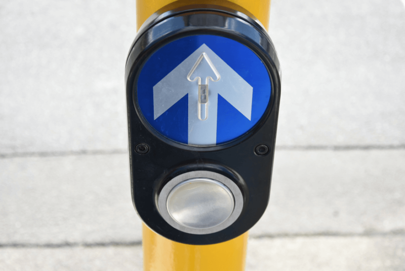 Pedestrian crossing push button