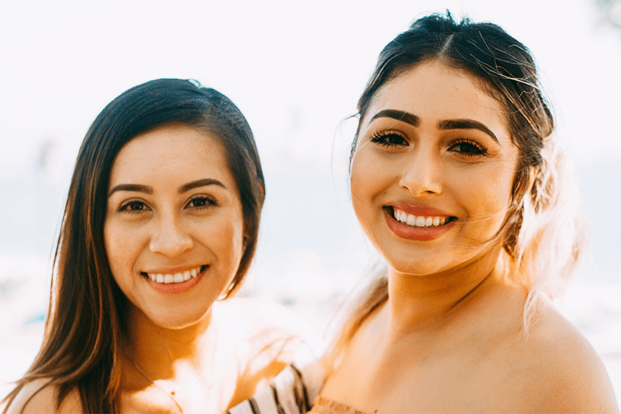 Two girls smiling