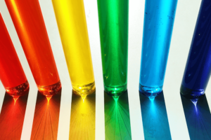 Rainbow coloured spectrum of glass vials