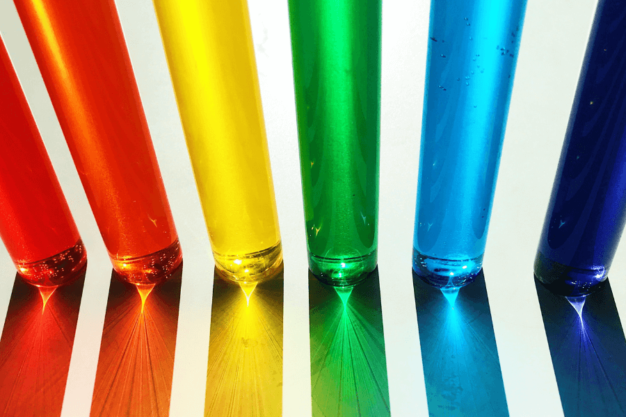 Rainbow coloured spectrum of glass vials