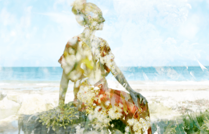 Double exposure of woman at the beach and eucalyptus blooms.