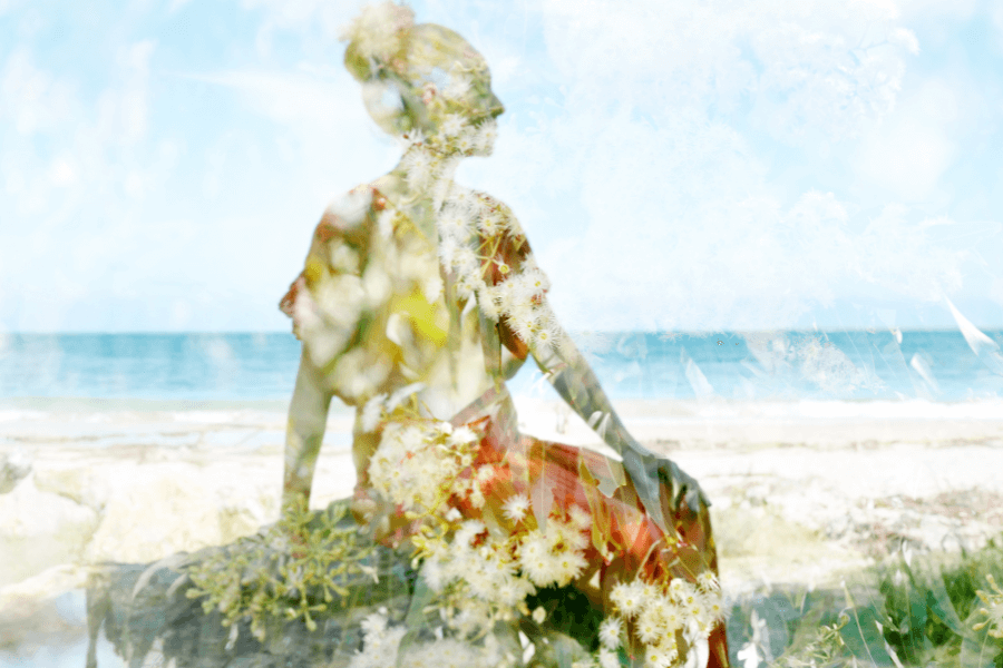 Double exposure of woman at the beach and eucalyptus blooms.