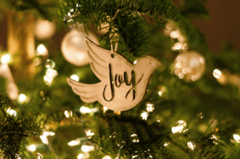 Christmas tree ornament with the word Joy