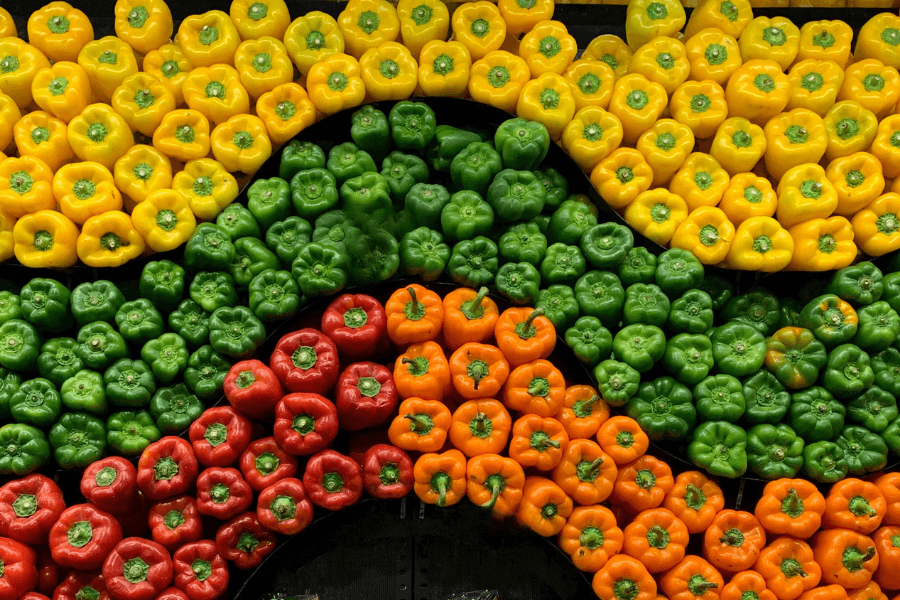 Display of red, yelllow, orange and green capsicums